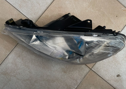 چراغ جلو چپ لنز خط دار بدون موتور ۲۰۶ لیبل ایساکو